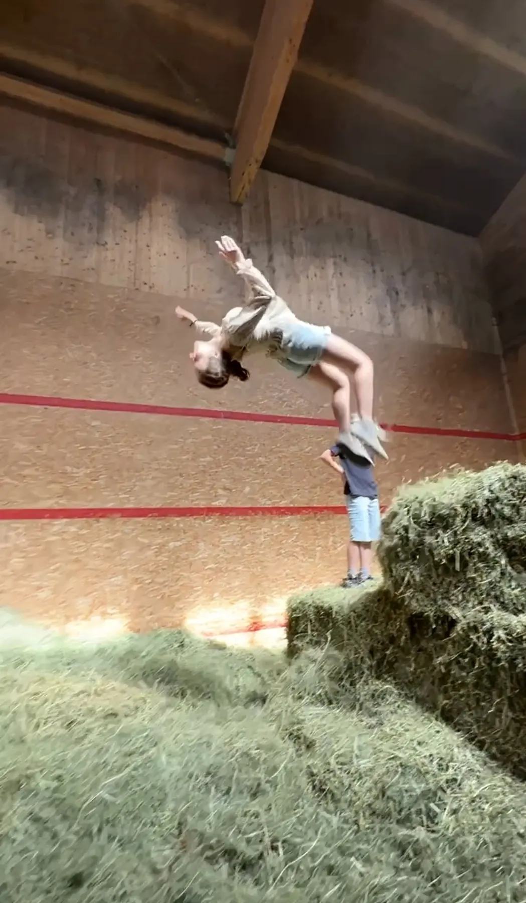 Backflip into a pile of hay
